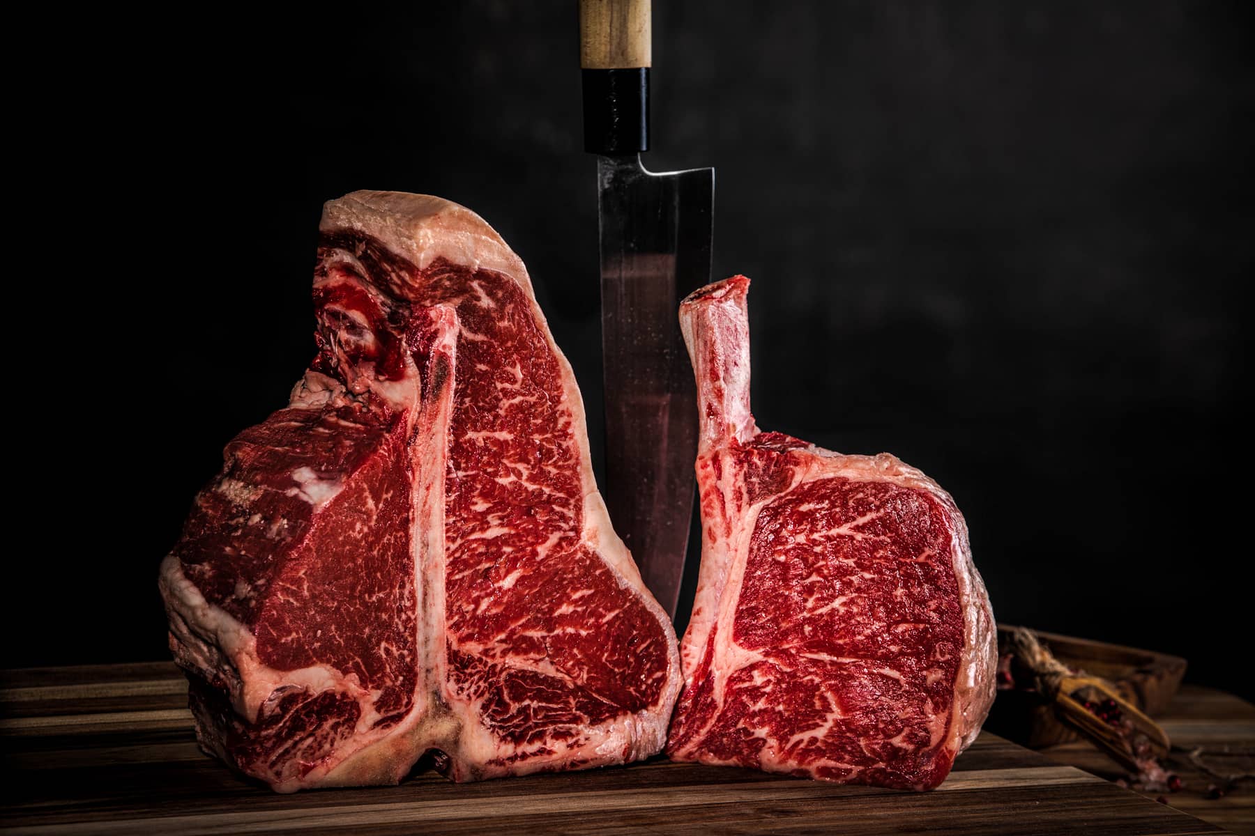 Two succulent bone-in steaks, perfect for a luxurious steak and seafood dinner.